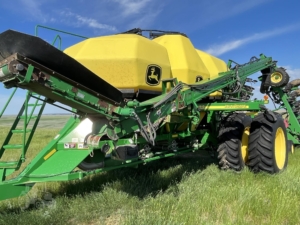 2014 John Deere 1895 Air Seeder in the field