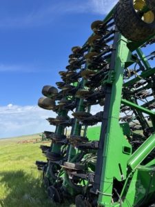 2014 John Deere 1895 Air Seeder in the field