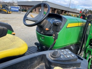 2015 John Deere 4044R tractor in action on the field