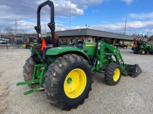 2015 John Deere 4044R tractor in action on the field