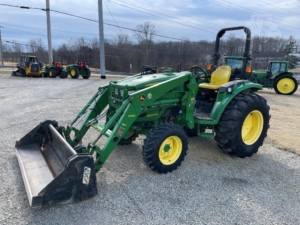 2015 John Deere 4044R tractor in action on the field