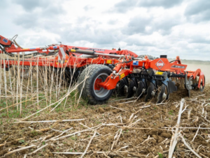 KUHN Optimer XL Trailed Stubble Cultivator working in a field