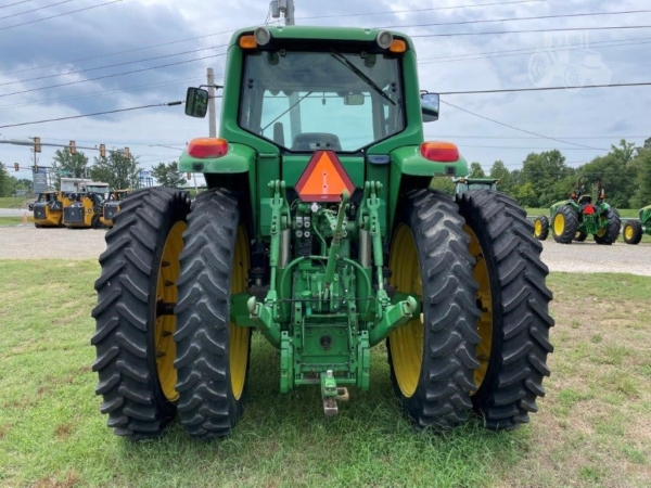 2009 John Deere 7430 Premium parked on a farm field