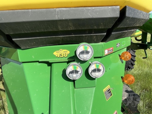 2014 John Deere 1895 Air Seeder in the field