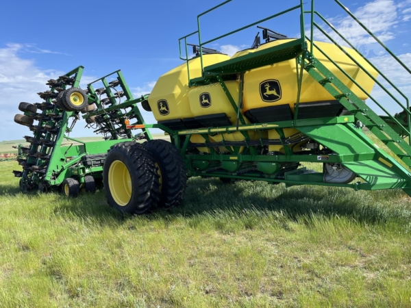 2014 John Deere 1895 Air Seeder in the field