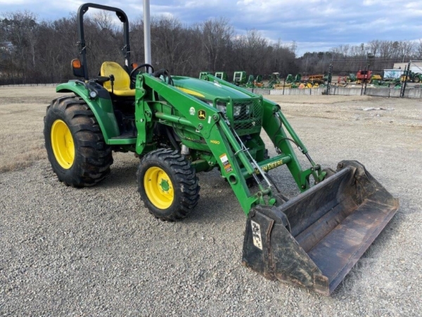 2015 John Deere 4044R tractor in action on the field