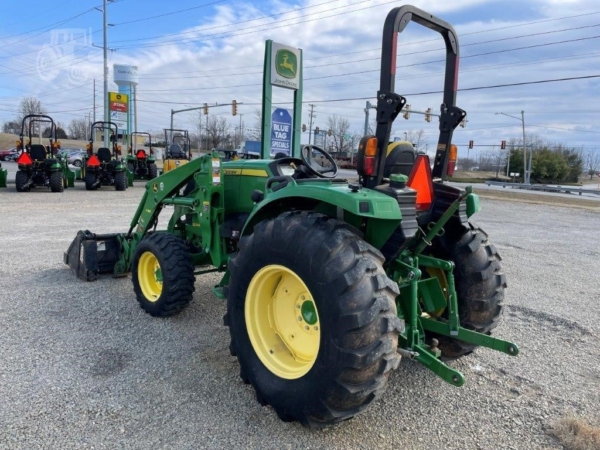 2015 John Deere 4044R tractor in action on the field