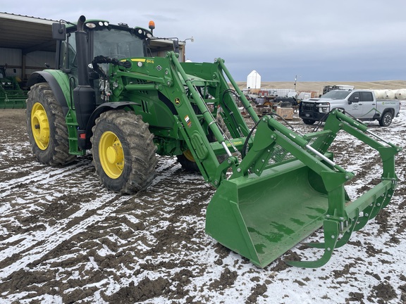 2024 John Deere 6155M in the field with tillage equipment