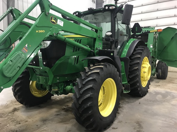 Side view of 2017 John Deere 6195R in field